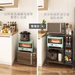 3 tier microwave cart with pull out drawers and easy rotatable wheels for kitchen storage solution smooth wooden base surface in Dubai, uae