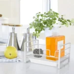 kitchen organizer for soap UAE, soap brush dispenser with drain tray Dubai, kitchen soap organizer Abu Dhabi, brush dispenser with drain tray UAE, soap dispenser holder UAE, kitchen sink organizer UAE, countertop soap holder Dubai, dishwashing brush organizer UAE, sink soap tray UAE, compact soap and brush holder UAE, premium kitchen organizer UAE, space-saving kitchen soap rack UAE, stylish soap holder for kitchen UAE, durable brush dispenser UAE, multifunctional soap tray UAE, rackstore.ae kitchen organizer, affordable kitchen brush holder UAE.